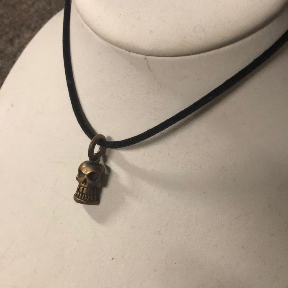 BRONZE GRINNING SKULL PENDANT